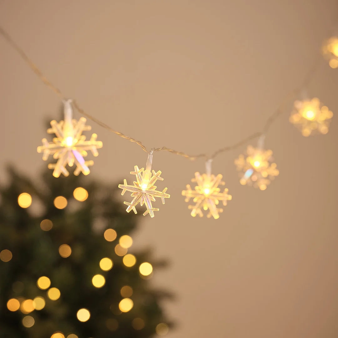 Warmweiße LED-Lichterkette mit 20 irisierenden Schneeflocken