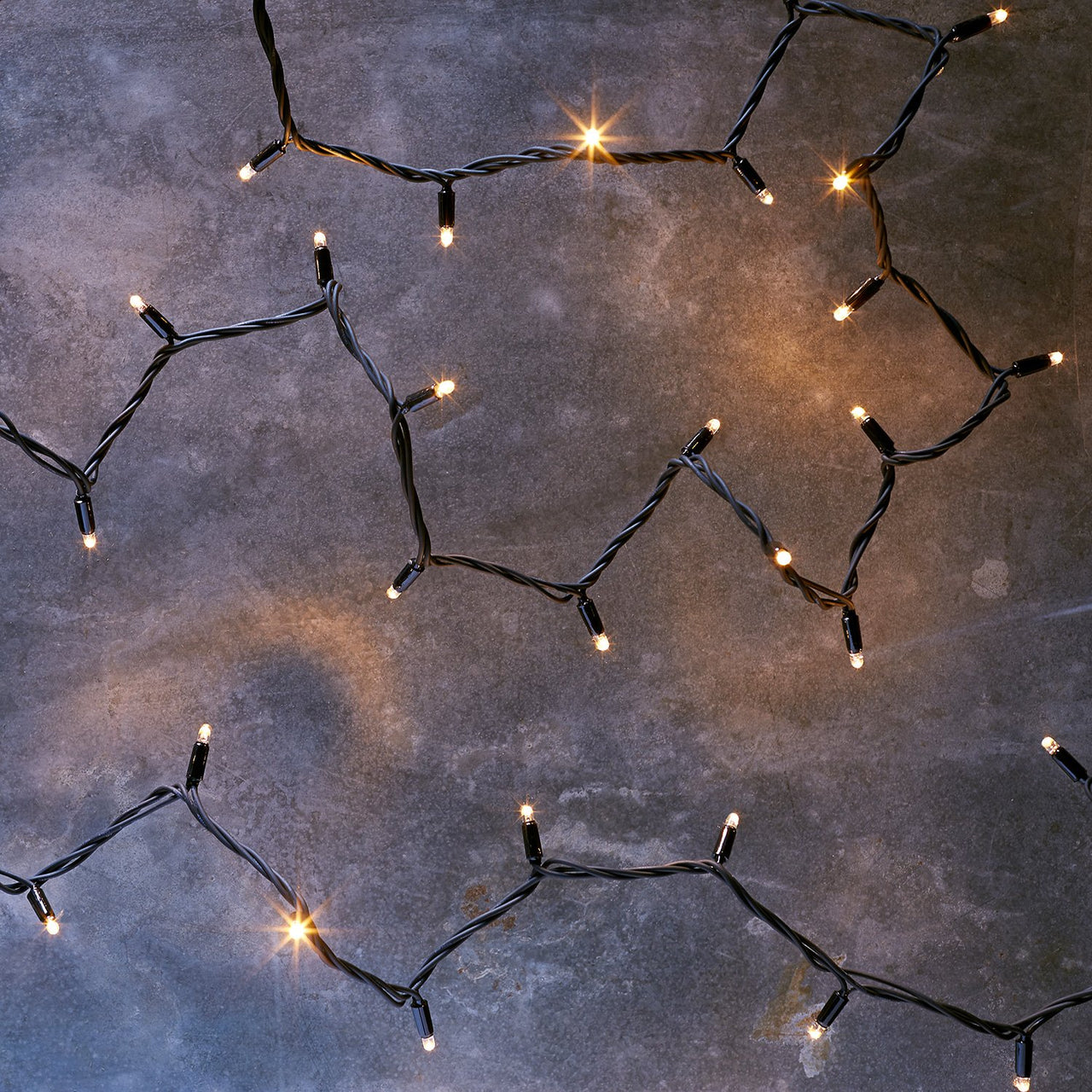 120m 1200er LED Lichterkette gold warmweiß koppelbar schwarzes Kabel Pro Serie