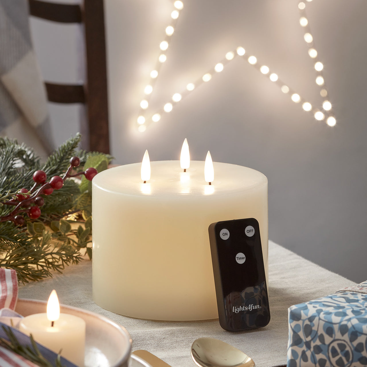 TruGlow® dreidochtige LED Kerze Echtwachs elfenbeinfarben mit Fernbedienung