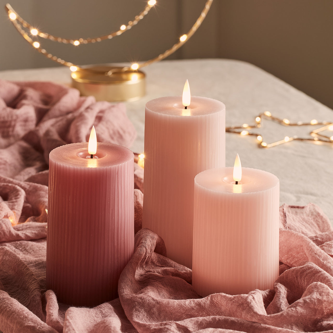 TruGlow® LED Kerzen Echtwach Trio geriffelt rosa