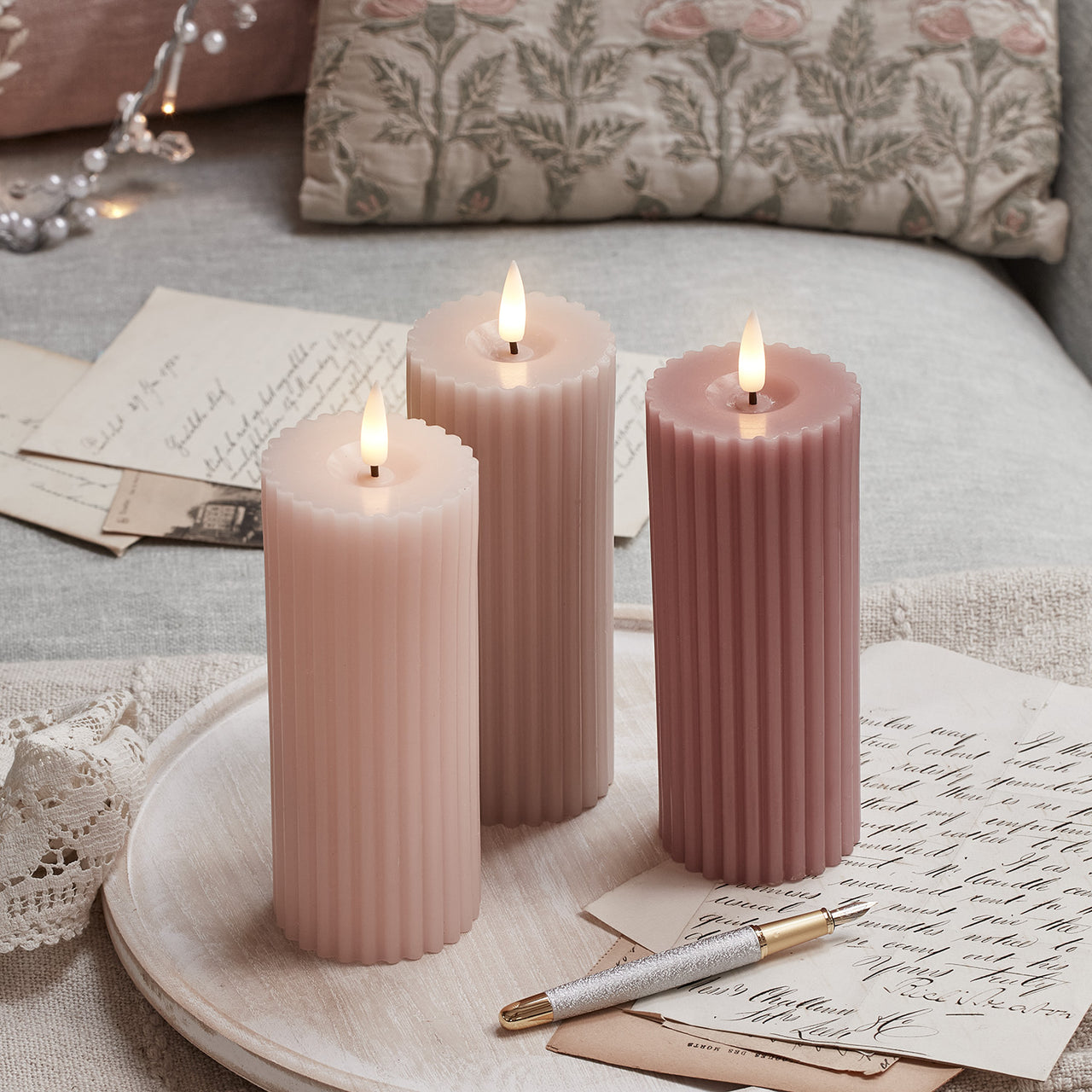 TruGlow® LED Kerzen Trio rosa geriffelt mit Fernbedienung