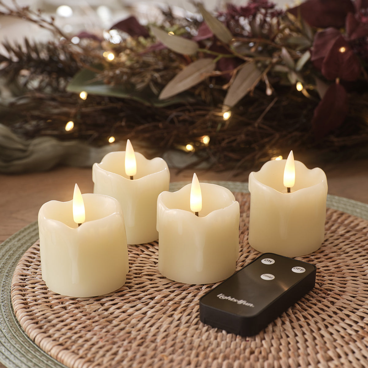 4er Set TruGlow® LED Teelichter mit Wachstropfen