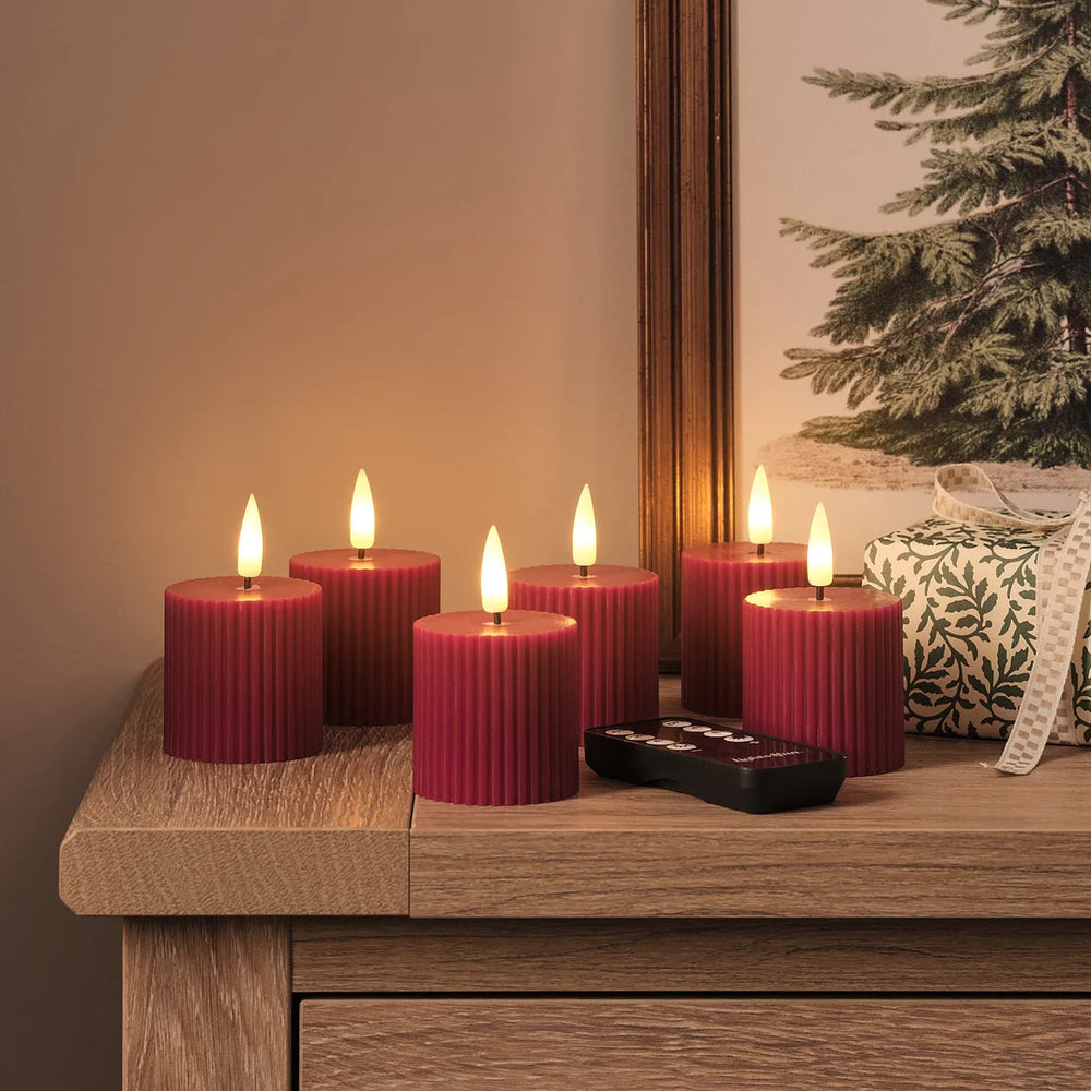 Rote LED-Kerzen → Echtwachs, Timer & Fernbedienung