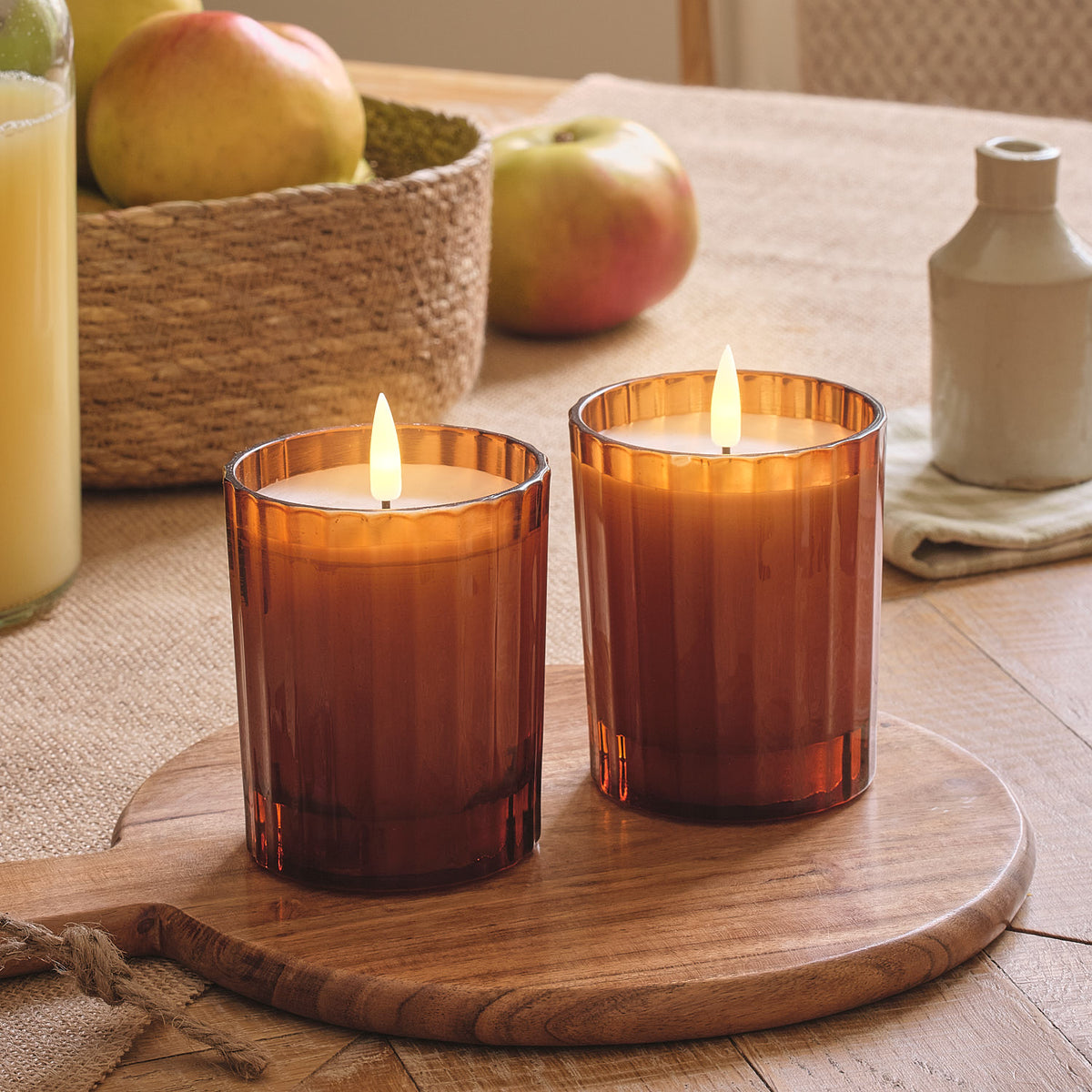 2er Set TruGlow® LED-Kerzen im geriffelten Glas in Orange mit Fernbedi