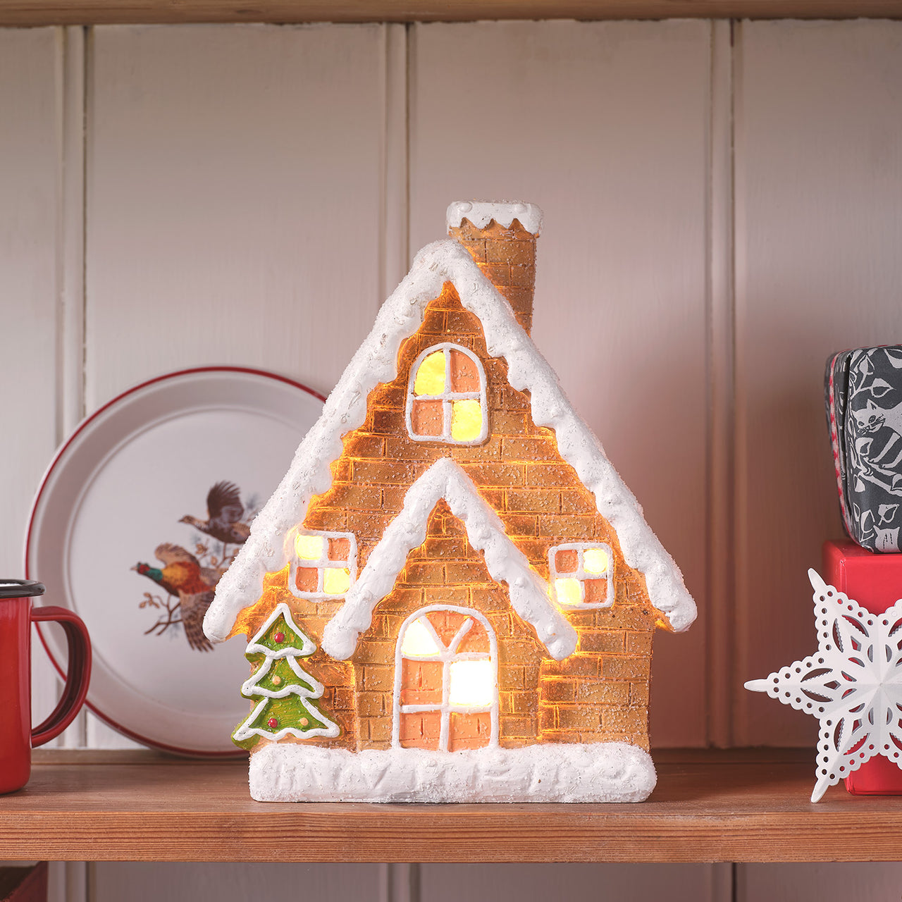 Leuchtende Häuschen & Lichterkette mit Lebkuchenmännchen