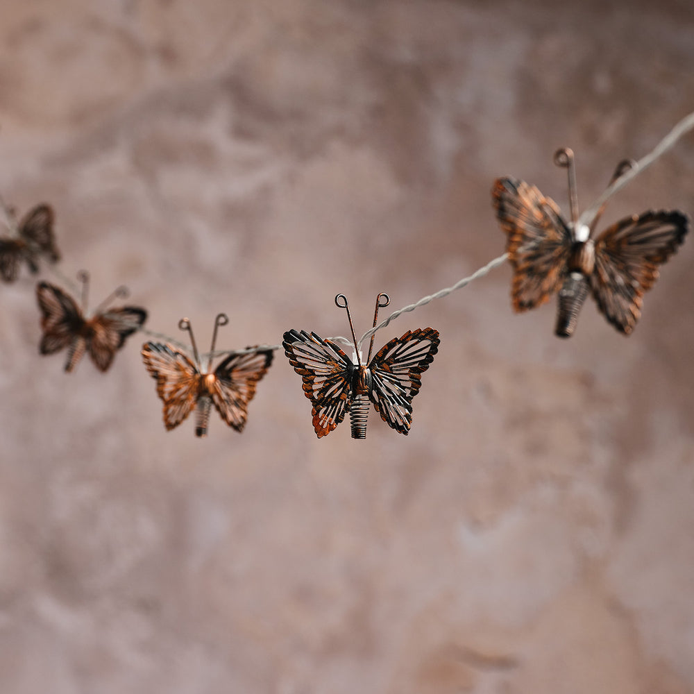 Solar-Lichterkette mit kupferfarbenen Schmetterlingen mit 10 warmweißen LEDs