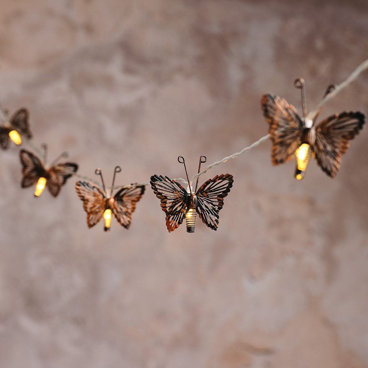 Solar-Lichterkette mit kupferfarbenen Schmetterlingen mit 10 warmweißen LEDs