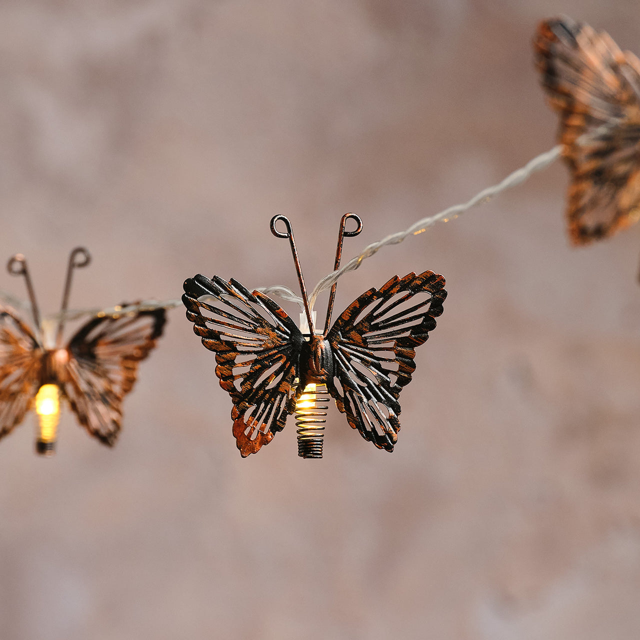 Solar-Lichterkette mit kupferfarbenen Schmetterlingen mit 10 warmweißen LEDs