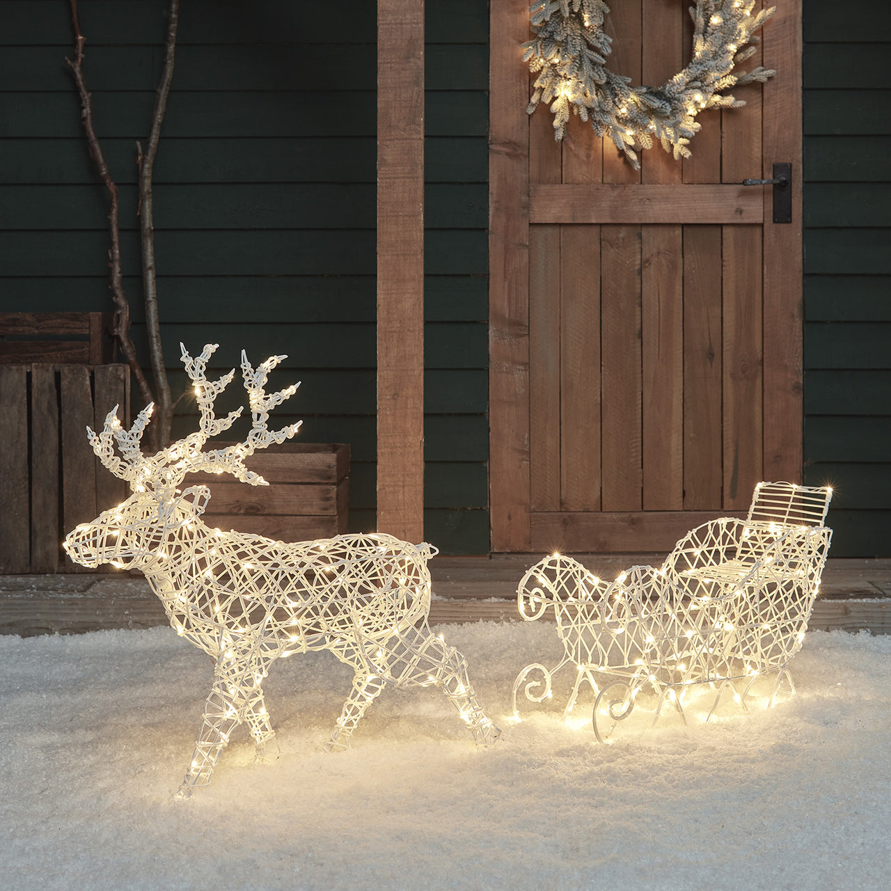 Arkendale 70cm Bicolor LED Rentier mit Schlitten