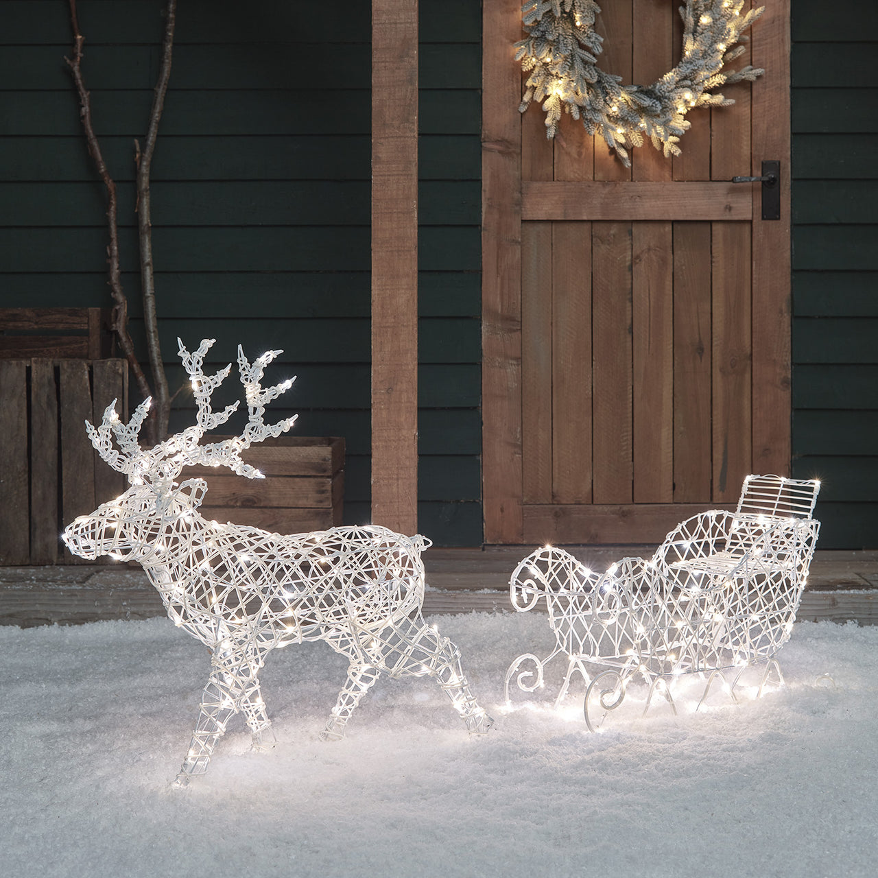 Arkendale 70cm Bicolor LED Rentier mit Schlitten