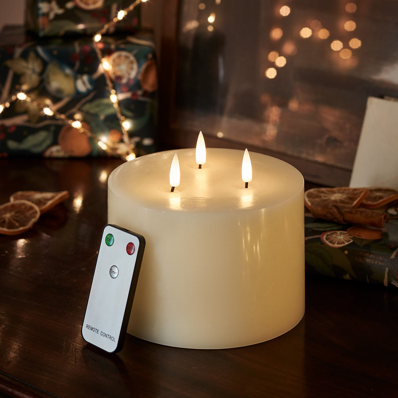 TruGlow® dreidochtige LED Kerze elfenbeinfarben mit Fernbedienung