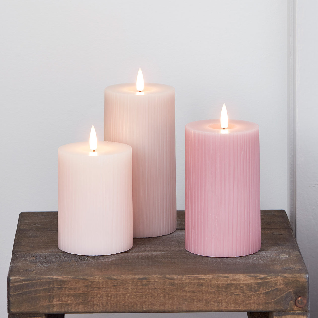 TruGlow® LED Kerzen Echtwach Trio geriffelt rosa