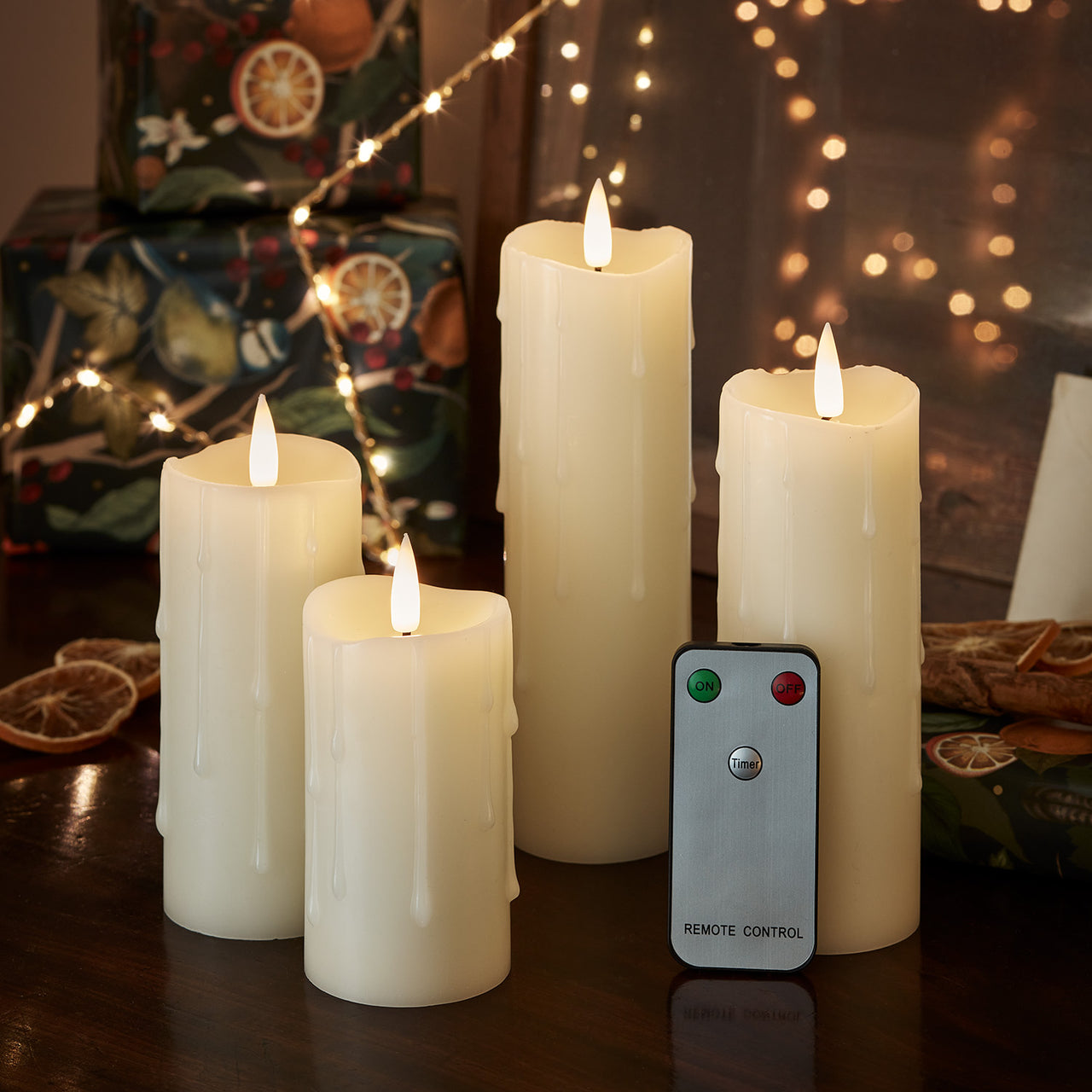 4er Set TruGlow® LED Kerzen Echtwachs schmal mit Wachstropfen mit Fernbedienung