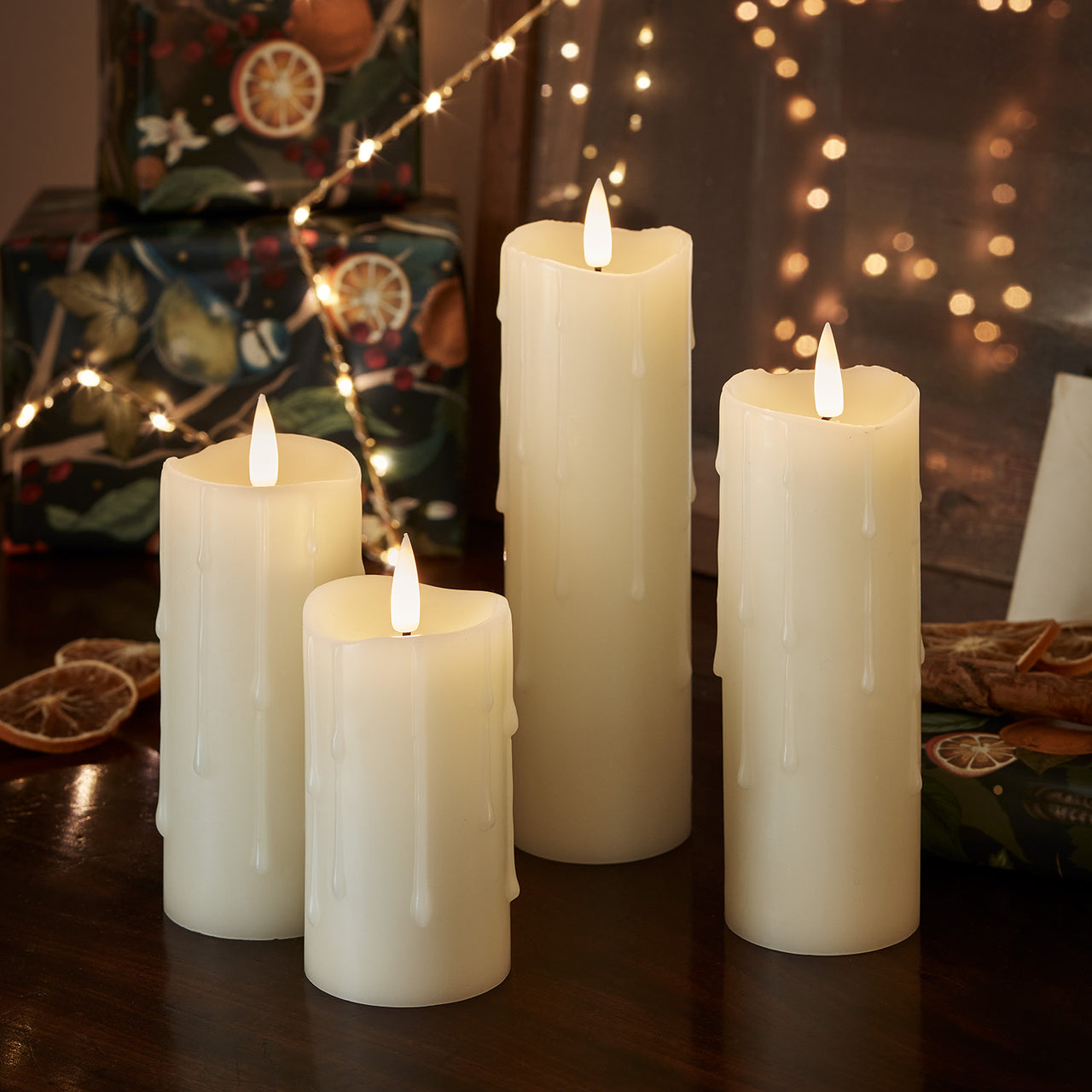 4er Set TruGlow® LED Kerzen schmal mit Wachstropfen mit Fernbedienung