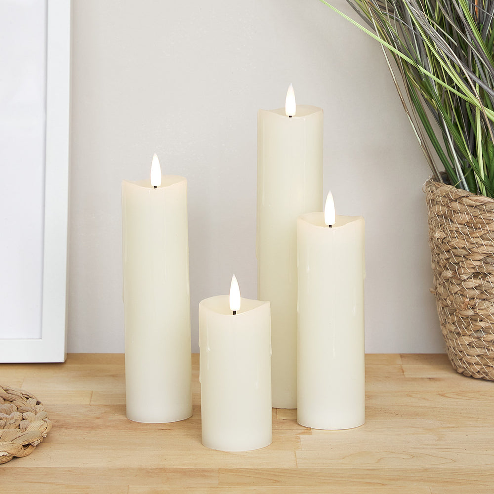 4er Set TruGlow® LED Kerzen Echtwachs schmal mit Wachstropfen mit Fernbedienung