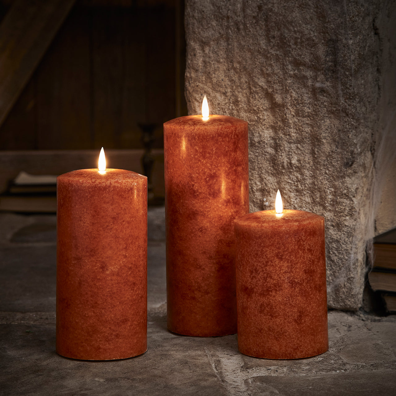 TruGlow® LED Kerzen Trio orange Ø 10cm mit Fernbedienung