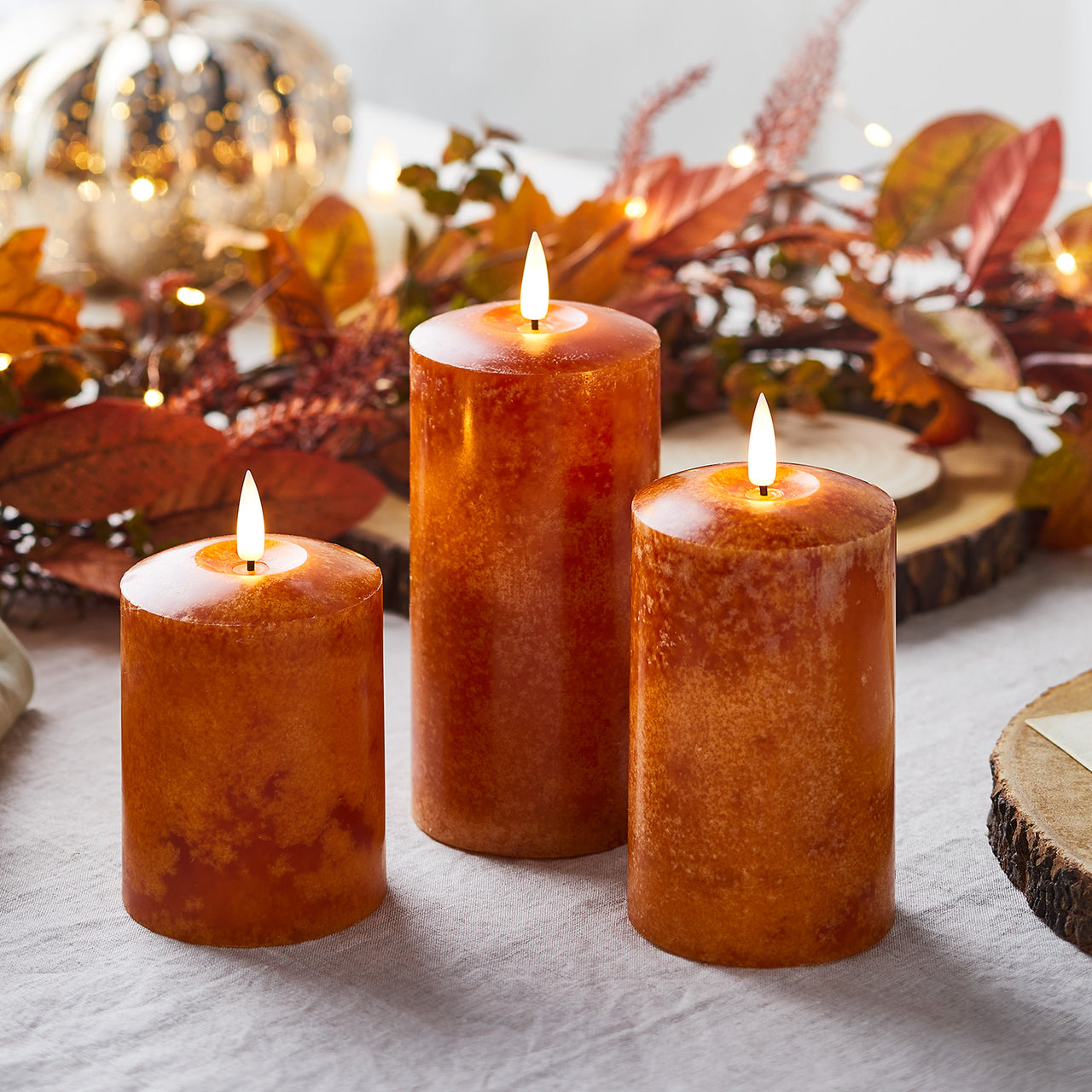 Herbstdeko Truglow® LED Kerzen Trio und LED Deko Kürbis