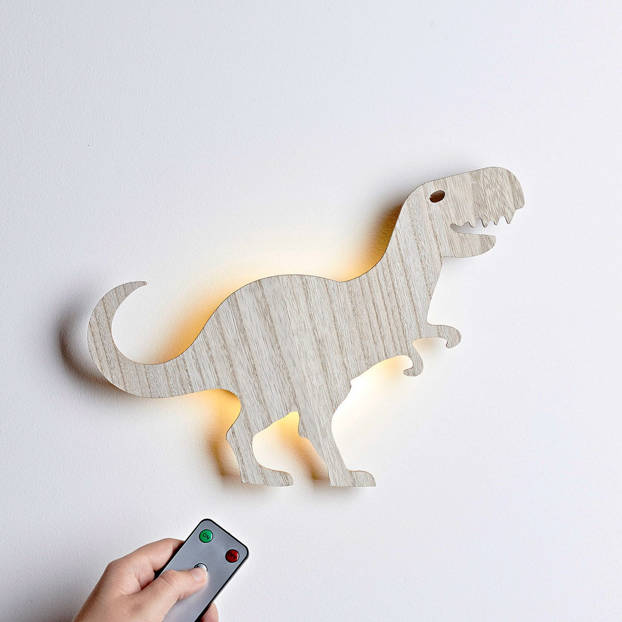 Tyrannosaurus Rex Wandleuchte mit Fernbedienung.