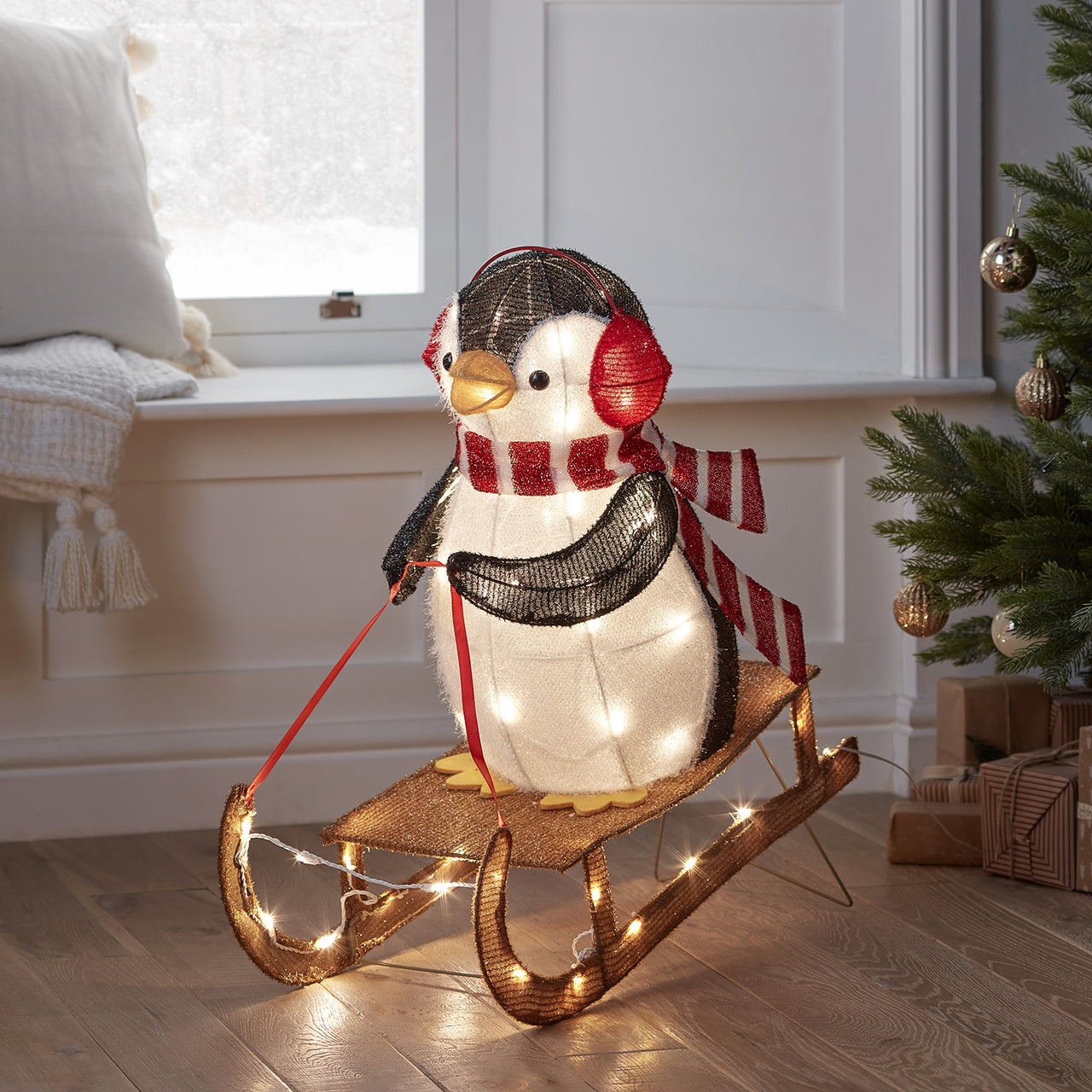 LED Weihnachtsfigur außen Pinguin auf Schlitten –