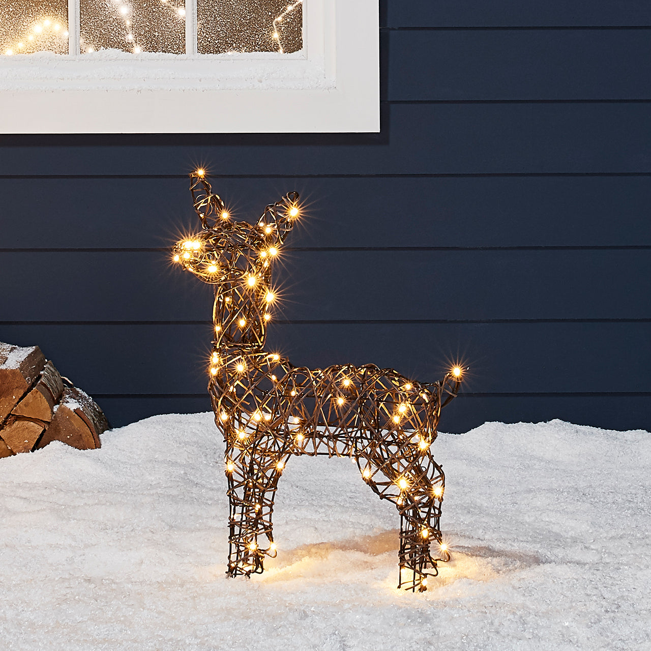 Studley Rattan LED Rentier Kind Weihnachtsfigur außen